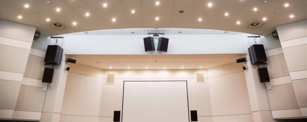 An event space in the Sydney CBD with a speaker system and projection screen designed and installed by Sydney Audio Visual Consultants